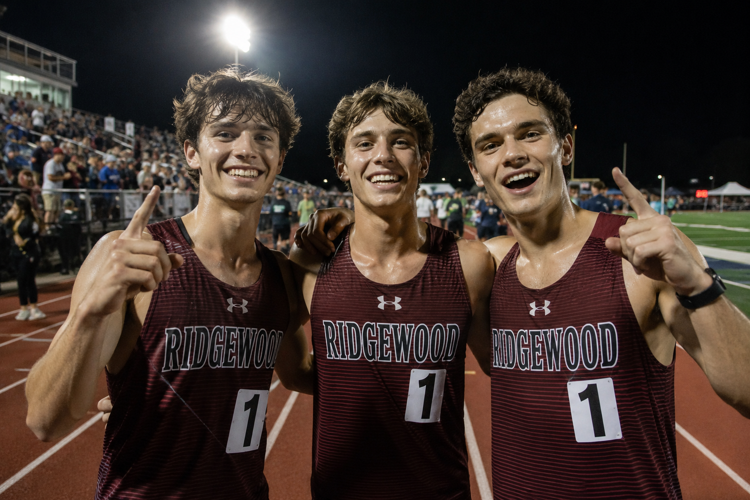 High school track athletes celebrating
